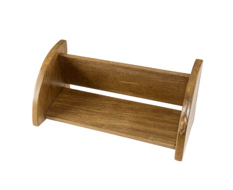 AN EARLY ROBERT MOUSEMAN THOMPSON OAK BOOK TROUGH, with carved mouse signature to one side. Length 45cm 