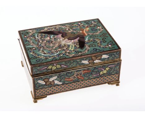 A STRIKING CHINESE CLOISONNE ENAMEL BOX, EARLY 20th CENTURY, the hinged cover decorated with a pheasant in flight. 6.5cm by 1