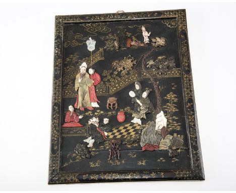 A 19th CENTURY CHINESE LACQUERED PANEL OF RECTANGULAR FORM, painted in gilt and applied in high relief with hardstone, ivory 