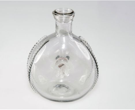 A GLASS PILGRIM FLASK, PROBABLY LATE 17th CENTURY, of flattened ring form, applied with four bands of trailed decoration. 16.