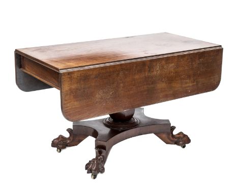 AN EARLY 19th CENTURY MAHOGANY SOFA TABLE, the rectangular top with rounded corners over a frieze drawer opposed by a dummy, 