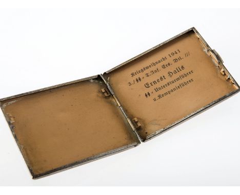 A WORLD WAR II NAZI SS OFFICER'S SILVER PLATED CIGARETTE CASE, inscribed to the interior 'kriegsweihnacht 1941' and with name