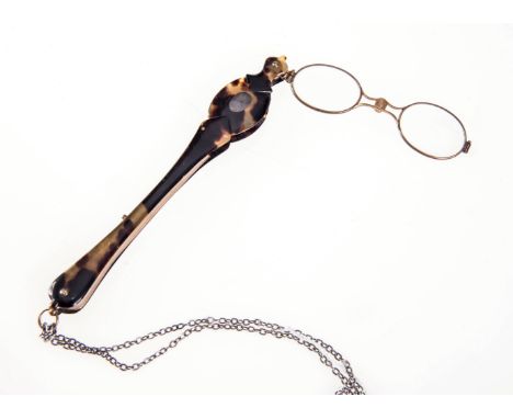 A VICTORIAN TORTOISESHELL & BRASS HANDLED LORGNETTE, the folding glasses spring-loaded, length 18cm 