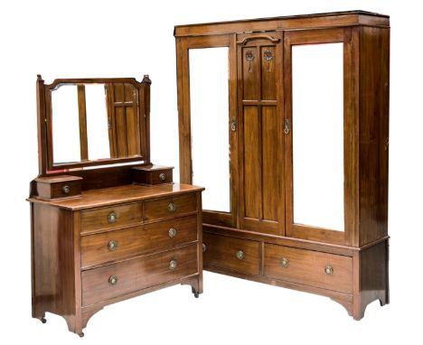 AN EDWARDIAN MAHOGANY TWO PIECE BEDROOM SUITE, comprising a wardrobe and a dressing table, the mirror fronted wardrobe with a