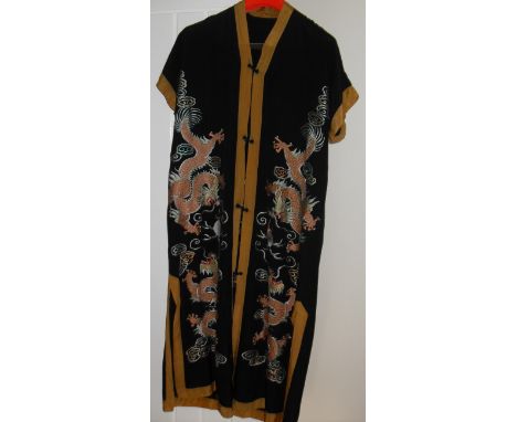 An early 20th century Kimono, a Mandarin coat and three fans, one with mother-of-pearl the others with ivory (5) 