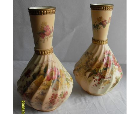 A pair of matching Royal Worcester blush ivory-ground vases with painted and printed floral decoration dated 1891, each 27 cm