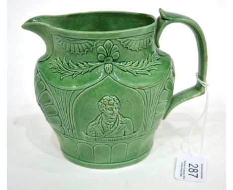 A Staffordshire Green Glazed Earthenware Jug, circa 1810, moulded with a titled bust portrait of SIR FRANCIS BURDETT BAR.T, t