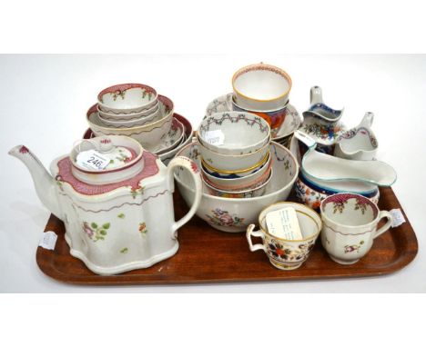 A Composite Newhall Porcelain Tea Service, circa 1790, comprising a commode shaped teapot and cover, three tea bowls and sauc