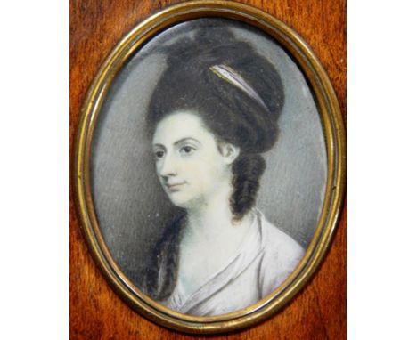 British School (Late 18th century) Portrait miniature of a lady in a white dress Watercolour on ivory, together with a portra