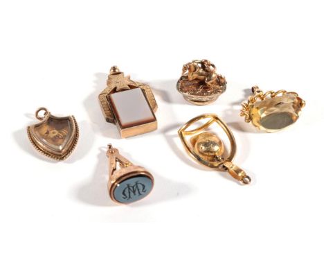 A Masonic Hardstone Intaglio Seal, monogrammed; An Equestrian Interest Hardstone Seal, with horse finial; A Jockey Cap and St