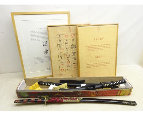 Two graduating replica Japanese Bushido style Samurai swords with stand, boxed, another replica Samurai sword, framed 'Magic 