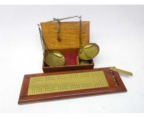 Cased set of portable brass scales with weights and brass mounted wooden cribbage board, L40cm (2)