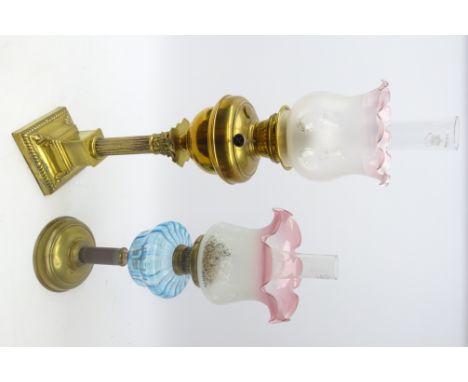 Victorian brass Corinthian column oil lamp with brass reservoir and frosted glass shade with pink frill rim, H81cm and anothe