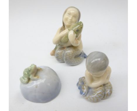 Three Royal Copenhagen figures: Frog on Stone no.507, Mermaid with Fish no. 2348 and Little Mermaid no. 2313 H7cm max (3)