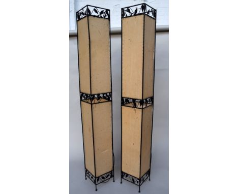 A pair of decorative metal and hide vintage uplighters 183cmH