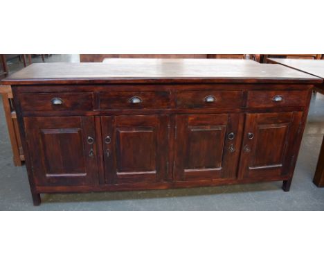 A dark teak sideboard with four short drawers over four cupboards each with internal shelf 185 x 53 x 85cm