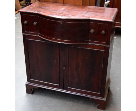 A cottage style bow fronted sideboard with cutlery drawer over cupboard on bracket feet