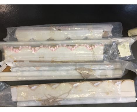 Eight Roller Blinds of various print and design with scalloped edge