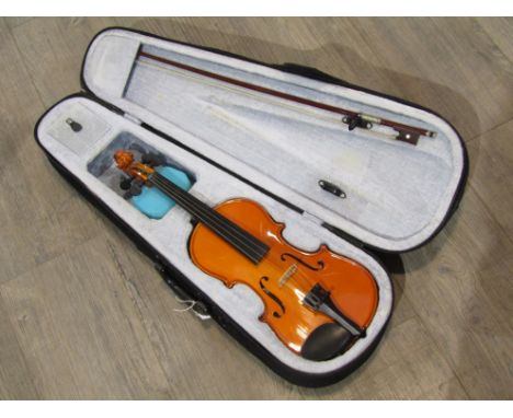 A Primavera 1/2 size violin, 52cm length, with bow and padded case 