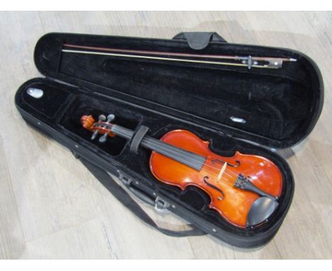 A Stentor Student 3/4 size violin, 56cm length, with bow and padded case 