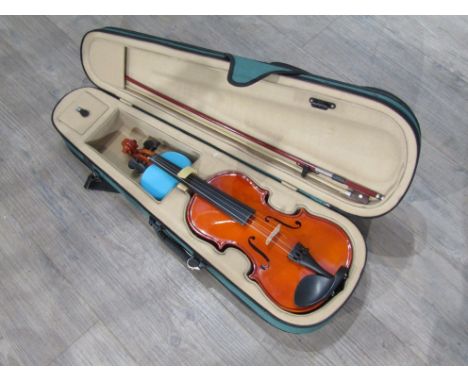 An Antoni 3/4 size violin with bow and padded case 