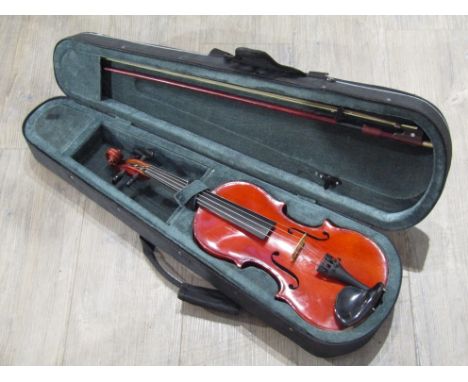 A 3/4 size violin with flamed maple back, 56cm length, with bow and padded case