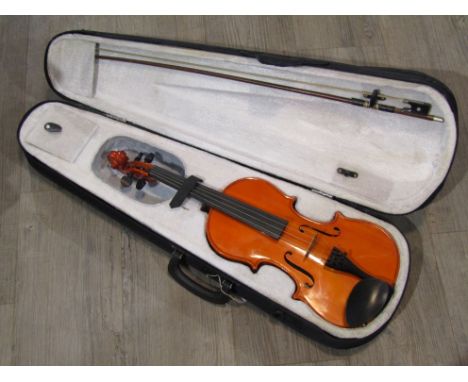 A Primavera 4/4 size violin, 59cm length, with bow and padded case 