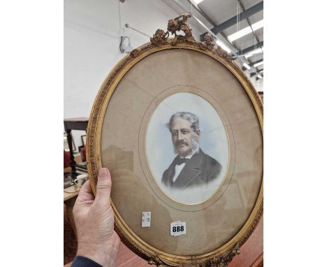 Antique gilt-framed portrait of a gentleman.