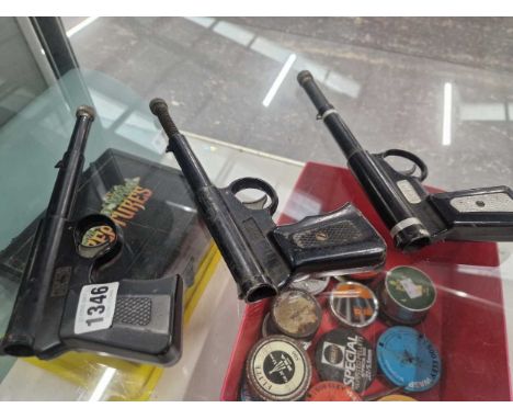 Three vintage Gat guns. 