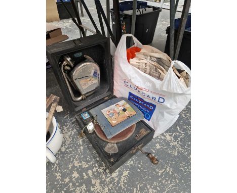 A vintage Decca portable gramophone and a quantity of 78 rpm records including Little tots records.