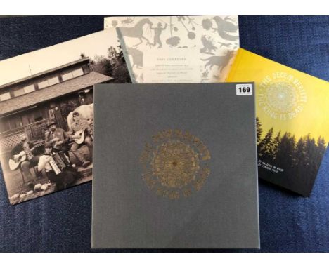 The Decemberists - The King is Dead box set, 1 x Lp record white vinyl, 1 x CD, 1 x DVD, book, and one of a kind Polaroid pho