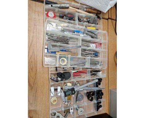 Four trays of watchmakers tools.
