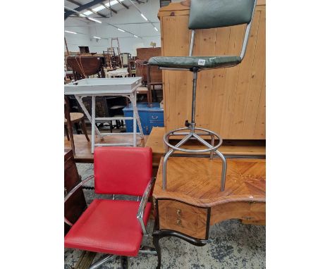 A vintage industrial-type stool and a swivel armchair wth a chrome frame. 