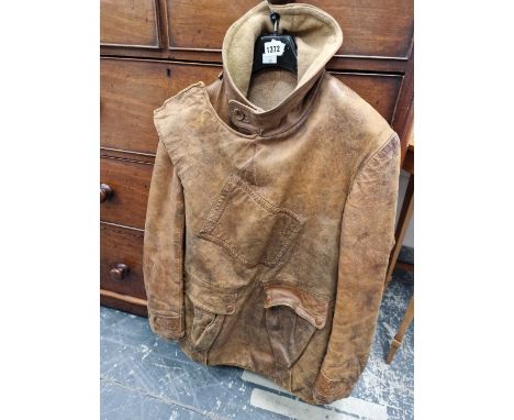 A good vintage leather driving coat with a map pocket and fur lining.