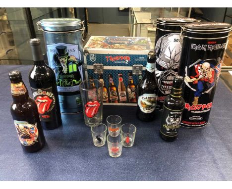 A collection of Iron maiden collectibles: presentation beer in tins with drinking glasses,, box of 12 'trooper' beer, Rolling