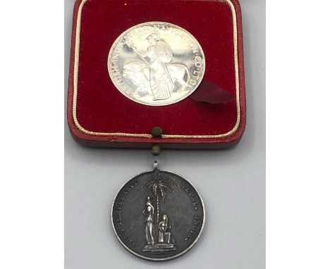 An Indian army silver Temperance, Watch and Be Sober, medal, dated 1897, and a British India Steam Navigation co, centenary s