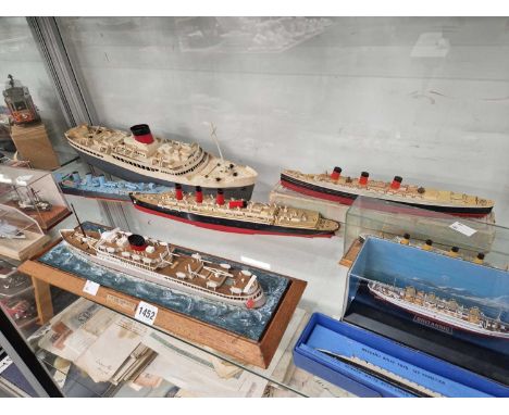 A clockwork passenger ship together with other scale model shipping
