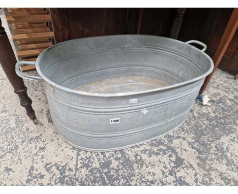 A vintage galvanised bath.