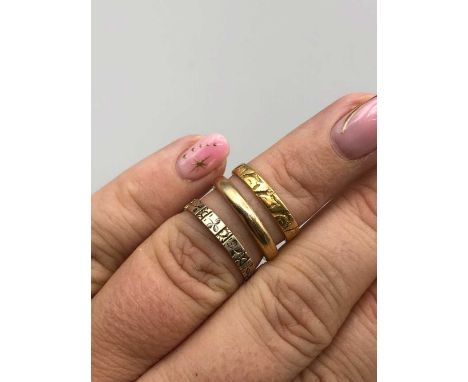 An antique Victorian 18ct gold hallmarked for Chester wedding ring, a 9ct hallmarked gold wedding band and one other with no 
