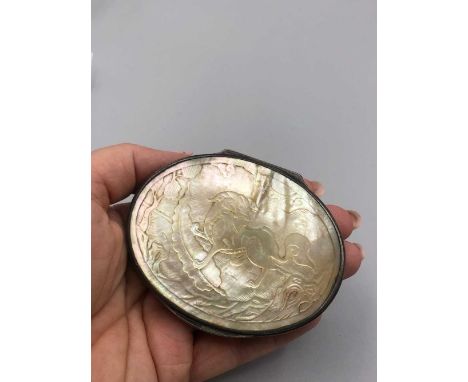 A 19th-century carved mother-of-pearl and eastern silver hinged lid snuff box. Measurements 8.2 x 6.5 cms. 