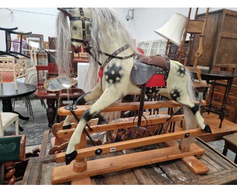 A vintage childs rocking horse
