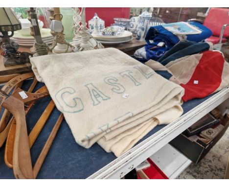 A vintage Union Castle line wool blanket, a sewn union flag,  union castle coat hangers etc.