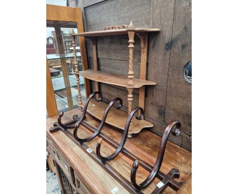 A bentwood coat rack and a wall shelf. 