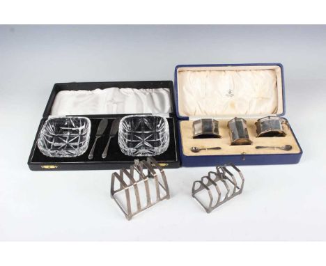 A George VI silver three-piece condiment set of octagonal form, comprising mustard, salt and pepper caster, with two condimen