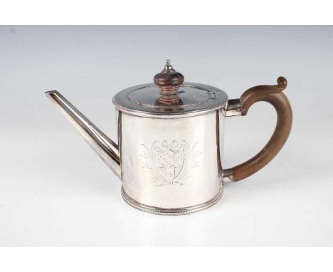 A George III silver cylindrical teapot, engraved with a coat of arms between beaded borders, London 1775 by Charles Wright, w