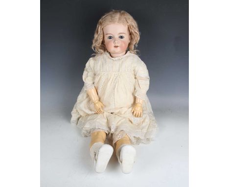 A group of Armand Marseille bisque head dolls, including Dream Baby black doll, four other Dream Baby dolls, all with bent li
