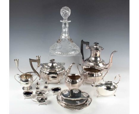 A plated three-piece tea set and a collection of other plated wares, including cutlery, together with a cut glass ship's deca