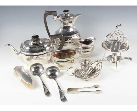 An Asprey London plated six-division toast rack with heater base, of circular domed form with central handle, fitted with a b