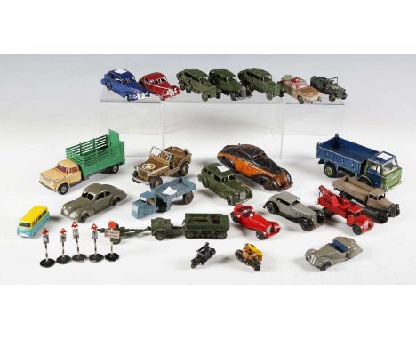 A collection of Dinky Toys vehicles and accessories, including No. 30d Vauxhall, No. 36c Humber Vogue, No. 39a Packard, 25 Se