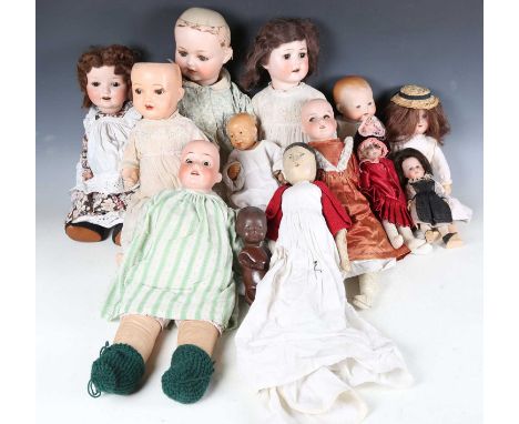 A group of dolls, including an Armand Marseille bisque head and shoulders doll, impressed ‘370’, three further Armand Marseil